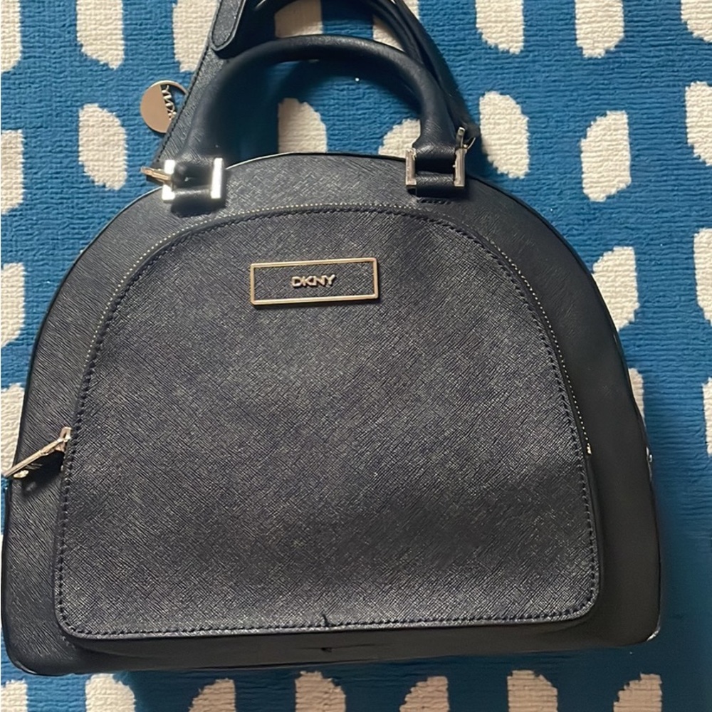 Leather DKNY domed black satchel bag includes dust, cover, and shipping